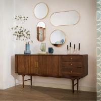 Elegancja mid century: komoda jako kluczowy element retro aranżacji